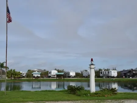 The lighthouse monument beside the pond at Beacon 44 RV Park