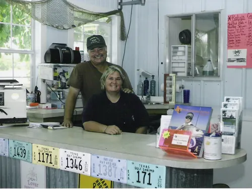 Doug and Mary Jo Walker behind the counter in the park office